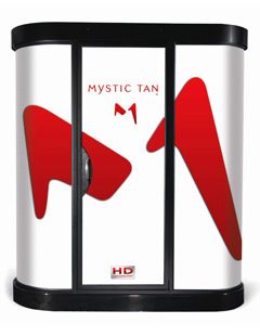 A white and red box with the words " mystic tan ".